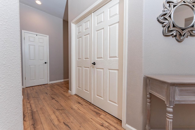 1774 Castle Way, Lemoore, CA 93245 - hall featuring light wood-style flooring, recessed lighting, and a textured wall