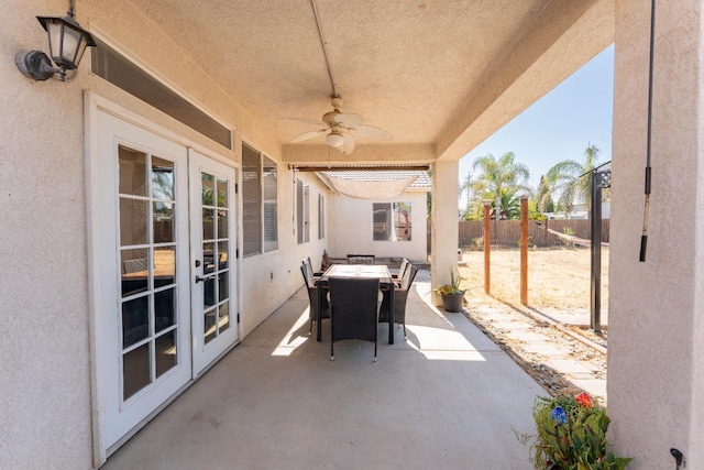1774 Castle Way, Lemoore, CA 93245 - fenced backyard with french doors, a ceiling fan, a patio area, and outdoor dining space