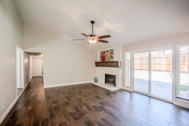 2540 Burgan Ave, Clovis, CA 93611 - unfurnished living room with a ceiling fan, dark wood-type flooring, and a brick fireplace