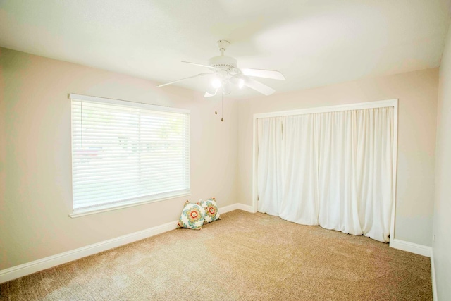 2540 Burgan Ave, Clovis, CA 93611 - empty room with carpet and a ceiling fan