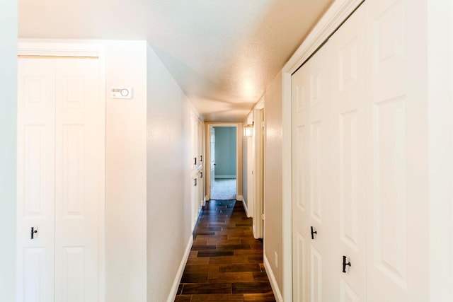 2540 Burgan Ave, Clovis, CA 93611 - corridor featuring dark wood-style floors and a textured ceiling