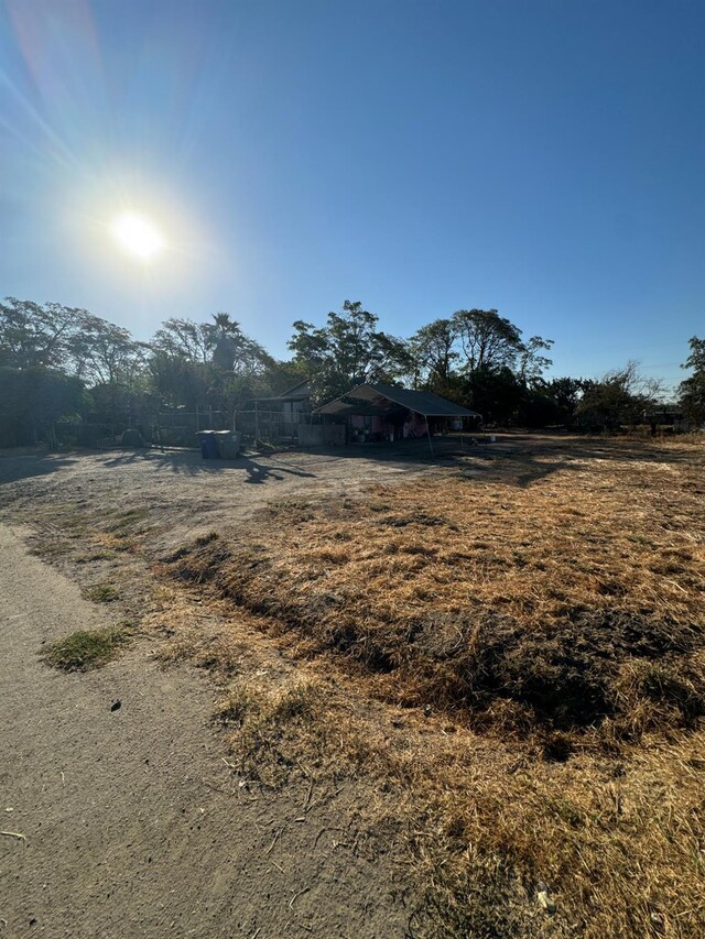 10691 Jones St, Riverdale, CA 93656 - view of yard featuring a rural view