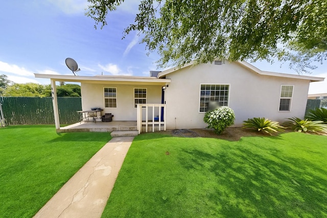 491 W Fir Ave, Pinedale, CA 93650 - back of house featuring stucco siding and a patio