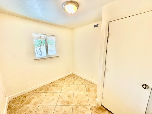 535 W Peralta Way, Fresno, CA 93705 - spare room featuring light tile patterned flooring and baseboards