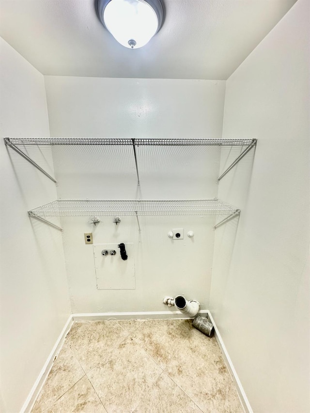 535 W Peralta Way, Fresno, CA 93705 - washroom with hookup for a gas dryer, hookup for an electric dryer, tile patterned flooring, and washer hookup