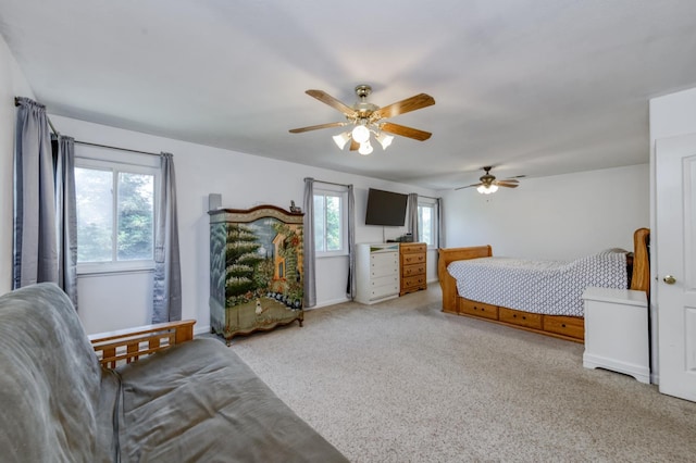 7718 N Constance Ave, Fresno, CA 93722 - bedroom with carpet floors and a ceiling fan
