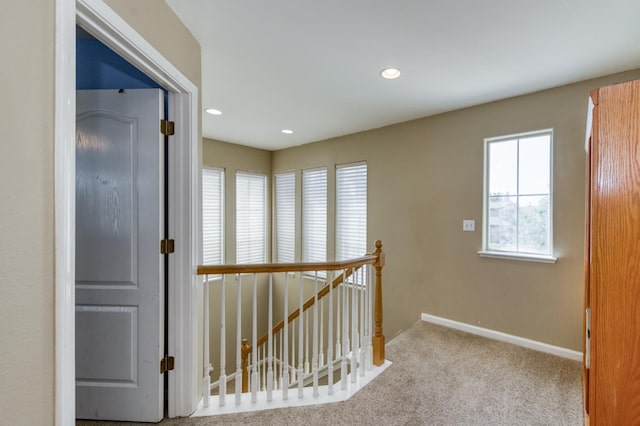 7718 N Constance Ave, Fresno, CA 93722 - hall featuring an upstairs landing, carpet, and recessed lighting