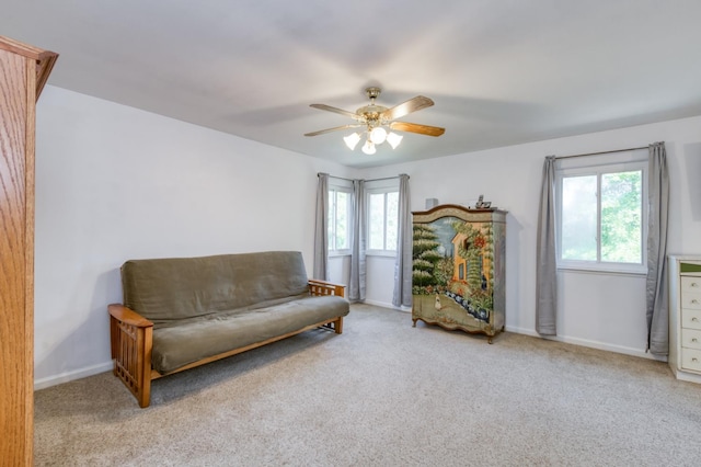 7718 N Constance Ave, Fresno, CA 93722 - sitting room with a ceiling fan and carpet flooring