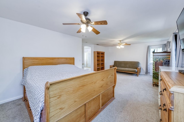 7718 N Constance Ave, Fresno, CA 93722 - carpeted bedroom with a ceiling fan and baseboards