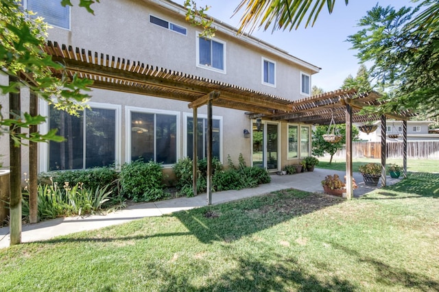 7718 N Constance Ave, Fresno, CA 93722 - rear view of property featuring a pergola, stucco siding, and a patio area