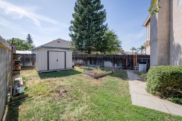 7718 N Constance Ave, Fresno, CA 93722 - fenced backyard with a storage unit and a vegetable garden