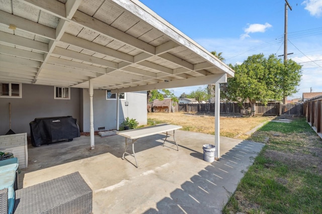 8620 La Vaca Way, Hanford, CA 93230 - fenced backyard with grilling area, a patio area, and a shed