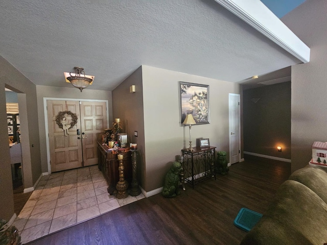36883 Cloverleaf Ave, Madera, CA 93636 - foyer entrance with wood finished floors and a textured ceiling