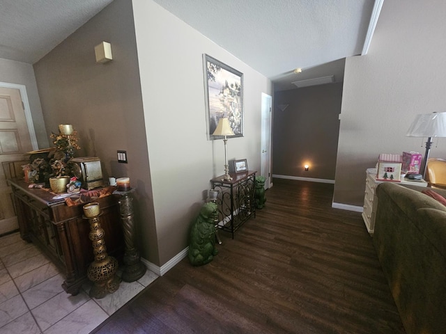 36883 Cloverleaf Ave, Madera, CA 93636 - hall featuring wood finished floors, a textured ceiling, and lofted ceiling