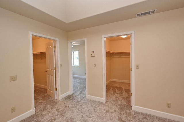 8037 E Morab Ave, Clovis, CA 93619 - unfurnished bedroom featuring a spacious closet, a closet, and carpet floors