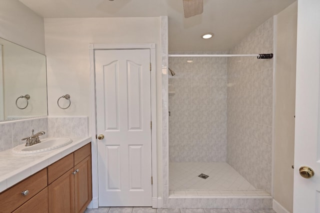 8037 E Morab Ave, Clovis, CA 93619 - bathroom featuring vanity, a tile shower, and recessed lighting