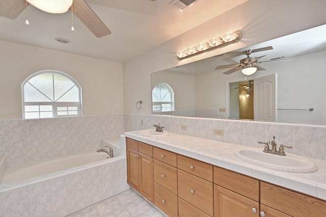 8037 E Morab Ave, Clovis, CA 93619 - bathroom with a ceiling fan, double vanity, a garden tub, and healthy amount of natural light