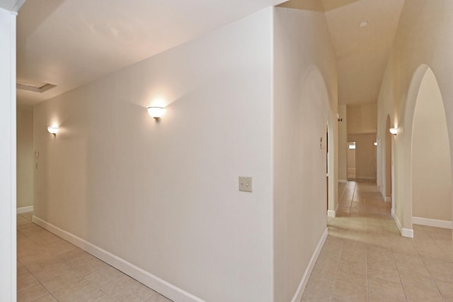 8037 E Morab Ave, Clovis, CA 93619 - hall featuring light tile patterned flooring and arched walkways