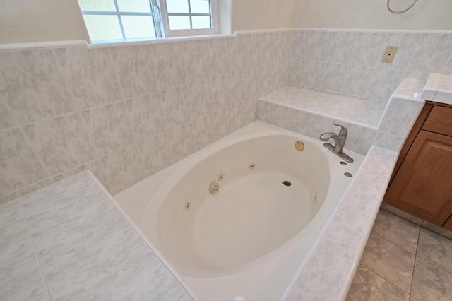 8037 E Morab Ave, Clovis, CA 93619 - bathroom featuring a whirlpool tub, vanity, and tile patterned flooring