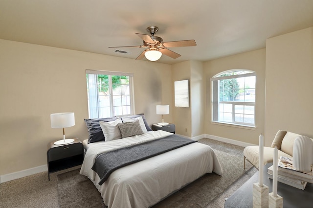 8037 E Morab Ave, Clovis, CA 93619 - bedroom featuring multiple windows, carpet, and a ceiling fan