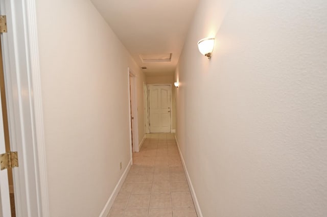 8037 E Morab Ave, Clovis, CA 93619 - hallway with light tile patterned flooring and baseboards