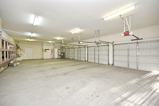8037 E Morab Ave, Clovis, CA 93619 - garage featuring a garage door opener