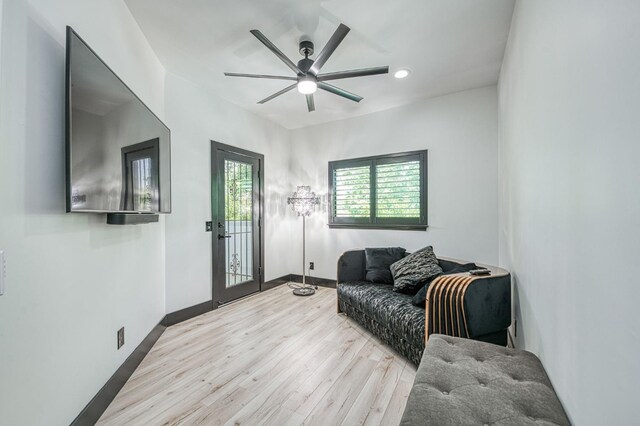 1292 E Valley Forge Dr, Fresno, CA 93720 - living area with wood finished floors, ceiling fan, and recessed lighting