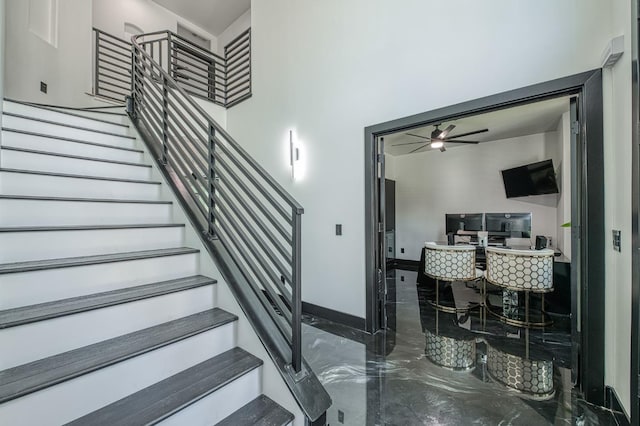1292 E Valley Forge Dr, Fresno, CA 93720 - staircase with a ceiling fan and marble finish flooring