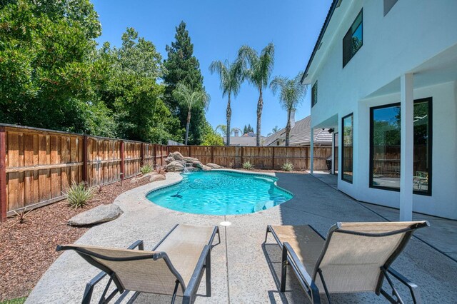 1292 E Valley Forge Dr, Fresno, CA 93720 - view of pool featuring a patio and a fenced backyard