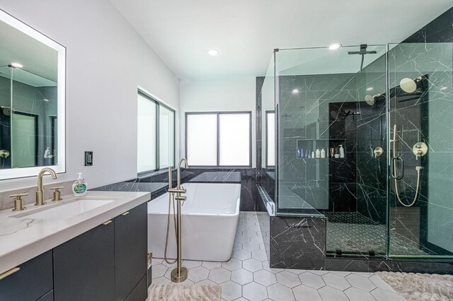 1292 E Valley Forge Dr, Fresno, CA 93720 - bathroom with vanity, tile patterned floors, a freestanding bath, a stall shower, and recessed lighting