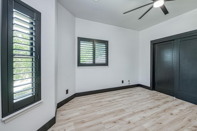 1292 E Valley Forge Dr, Fresno, CA 93720 - unfurnished bedroom with wood finished floors, ceiling fan, and a closet