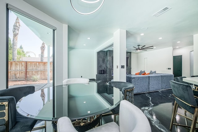 1292 E Valley Forge Dr, Fresno, CA 93720 - dining room featuring a ceiling fan, recessed lighting, and marble finish floors