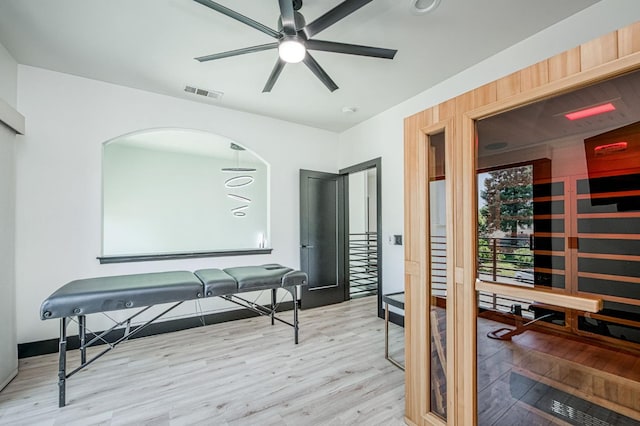 1292 E Valley Forge Dr, Fresno, CA 93720 - office with wood finished floors, a ceiling fan, arched walkways, and a relaxing sauna