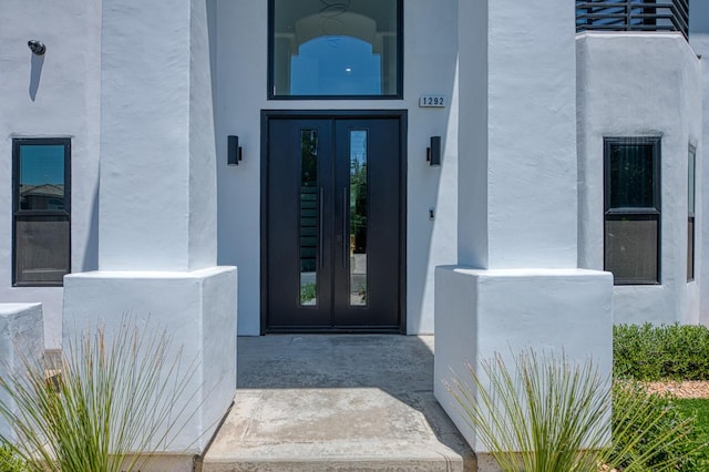 1292 E Valley Forge Dr, Fresno, CA 93720 - doorway to property featuring french doors and stucco siding
