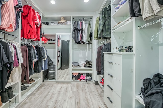 1292 E Valley Forge Dr, Fresno, CA 93720 - walk in closet with wood finished floors