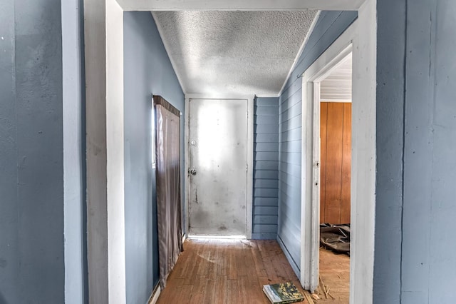 760 Sunnyside Ave, Clovis, CA 93611 - corridor featuring wood-type flooring and a textured ceiling