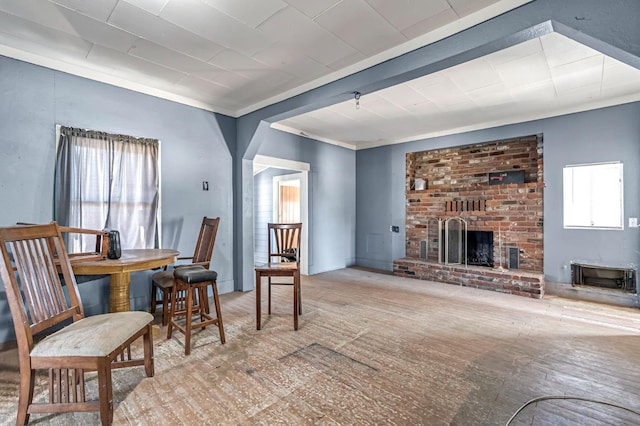 760 Sunnyside Ave, Clovis, CA 93611 - living area featuring a brick fireplace and ornamental molding