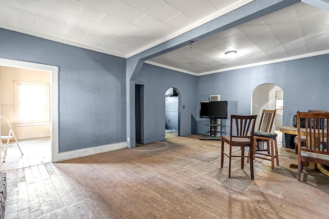 760 Sunnyside Ave, Clovis, CA 93611 - living area with arched walkways, wood-type flooring, and ornamental molding