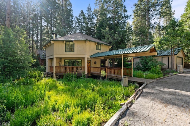 42215 Rock Ledge Rd, Shaver Lake, CA 96161 - view of front of home featuring a deck and a metal roof