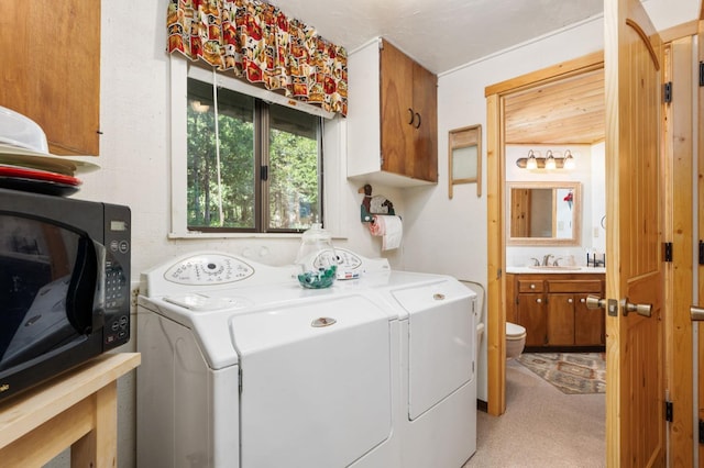 42215 Rock Ledge Rd, Shaver Lake, CA 96161 - laundry room with washing machine and dryer and cabinet space