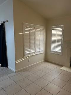 220 S Double Tree Way, Madera, CA 93637 - unfurnished room featuring lofted ceiling and light tile patterned flooring