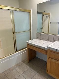 220 S Double Tree Way, Madera, CA 93637 - full bath featuring vanity, combined bath / shower with glass door, and tile patterned floors