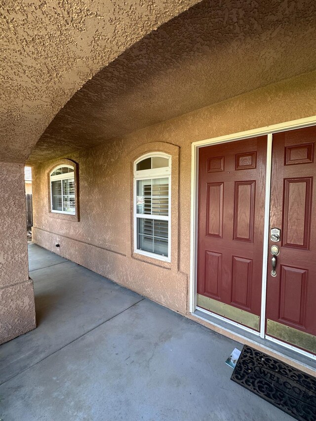 220 S Double Tree Way, Madera, CA 93637 - entrance to property with stucco siding