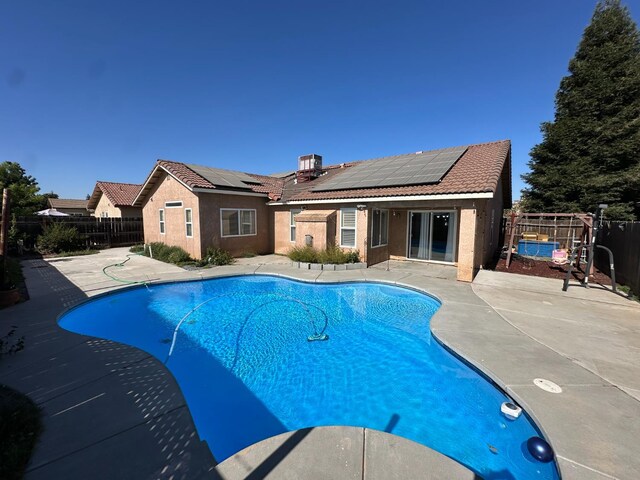 220 S Double Tree Way, Madera, CA 93637 - view of swimming pool featuring a patio and a fenced backyard