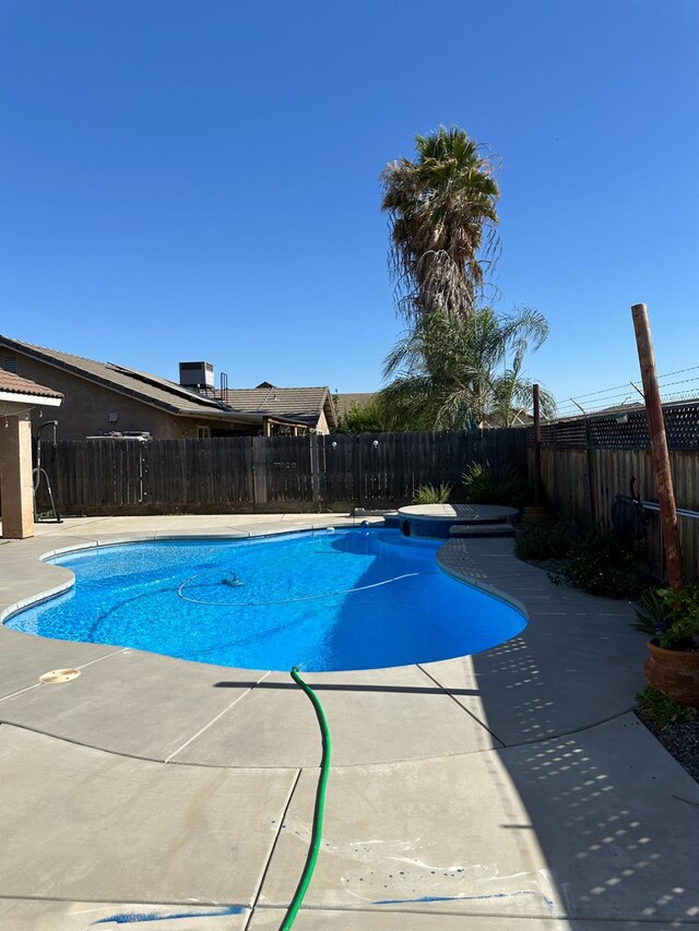 220 S Double Tree Way, Madera, CA 93637 - view of swimming pool featuring a fenced backyard and a patio area