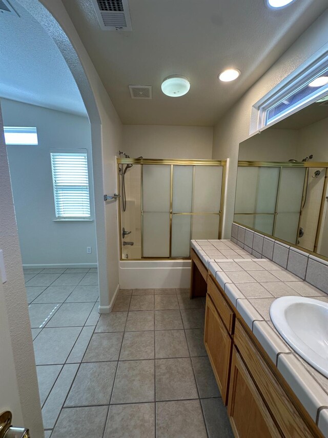 220 S Double Tree Way, Madera, CA 93637 - full bathroom with vanity, shower / bath combination with glass door, tile patterned flooring, and recessed lighting