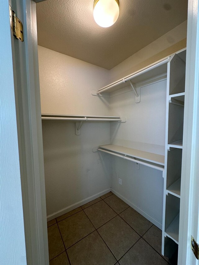 220 S Double Tree Way, Madera, CA 93637 - spacious closet featuring tile patterned floors