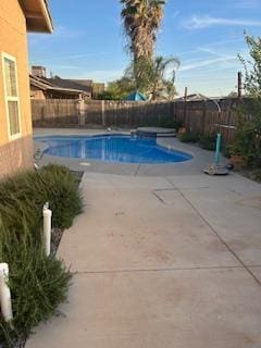 220 S Double Tree Way, Madera, CA 93637 - view of swimming pool featuring a fenced backyard and a patio area