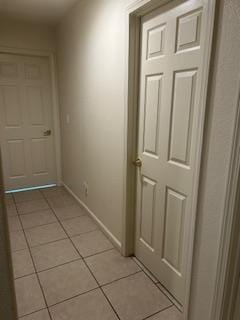 220 S Double Tree Way, Madera, CA 93637 - corridor with light tile patterned flooring and baseboards