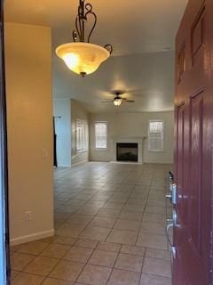 220 S Double Tree Way, Madera, CA 93637 - unfurnished living room with ceiling fan and a fireplace